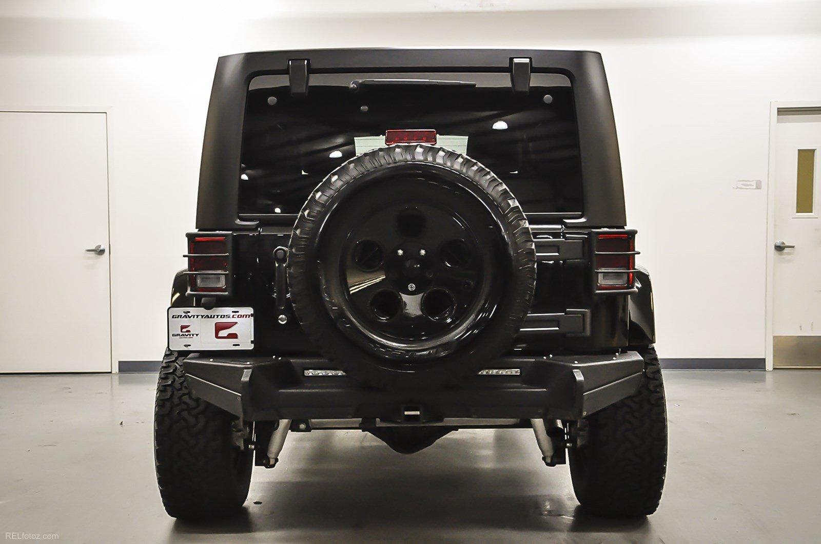 Used 2015 Jeep Wrangler Unlimited Sahara for sale Sold at Gravity Autos Marietta in Marietta GA 30060 5