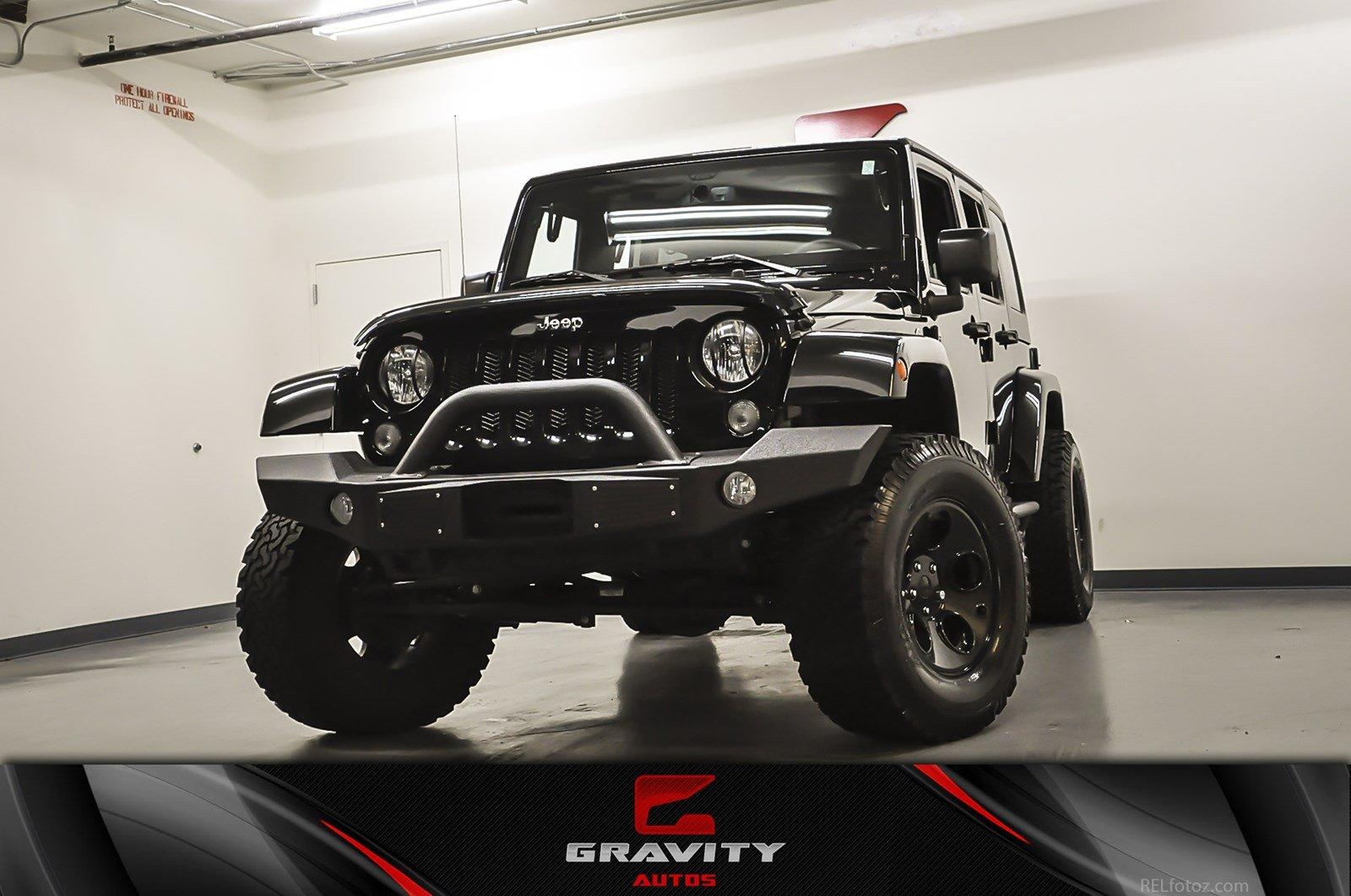 Used 2015 Jeep Wrangler Unlimited Sahara for sale Sold at Gravity Autos Marietta in Marietta GA 30060 1