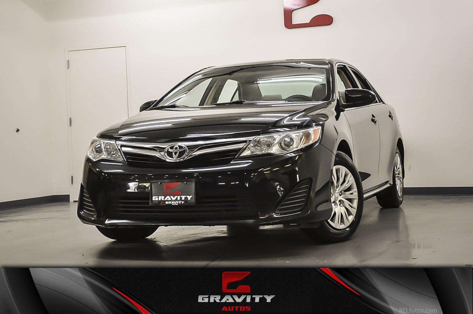 Used 2013 Toyota Camry LE for sale Sold at Gravity Autos Marietta in Marietta GA 30060 1