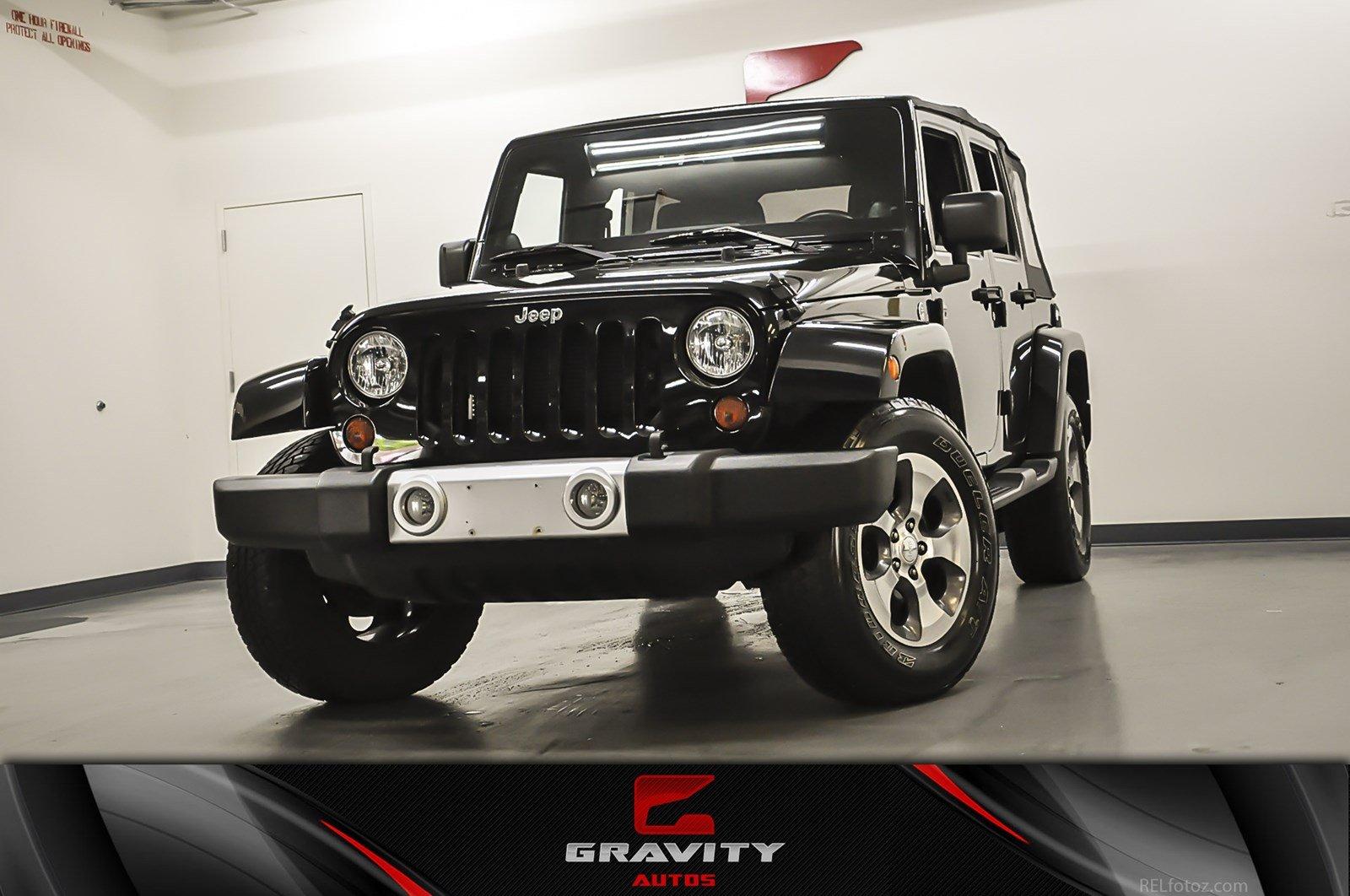 Used 2012 Jeep Wrangler Unlimited Sahara for sale Sold at Gravity Autos Marietta in Marietta GA 30060 1