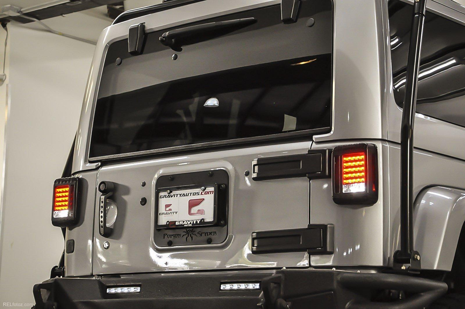 Used 2015 Jeep Wrangler Unlimited Sahara for sale Sold at Gravity Autos Marietta in Marietta GA 30060 18