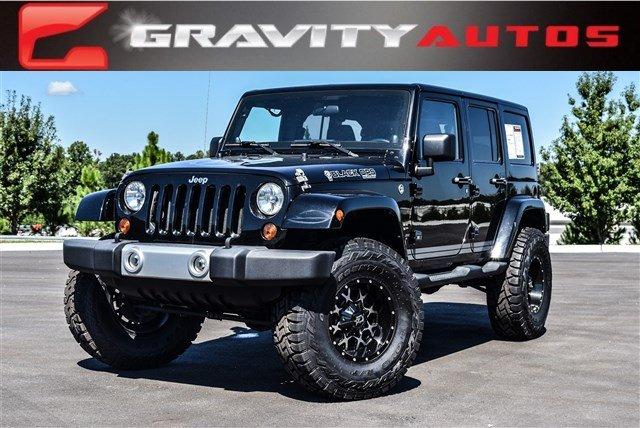 Used 2011 Jeep Wrangler Unlimited Sahara for sale Sold at Gravity Autos Marietta in Marietta GA 30060 1