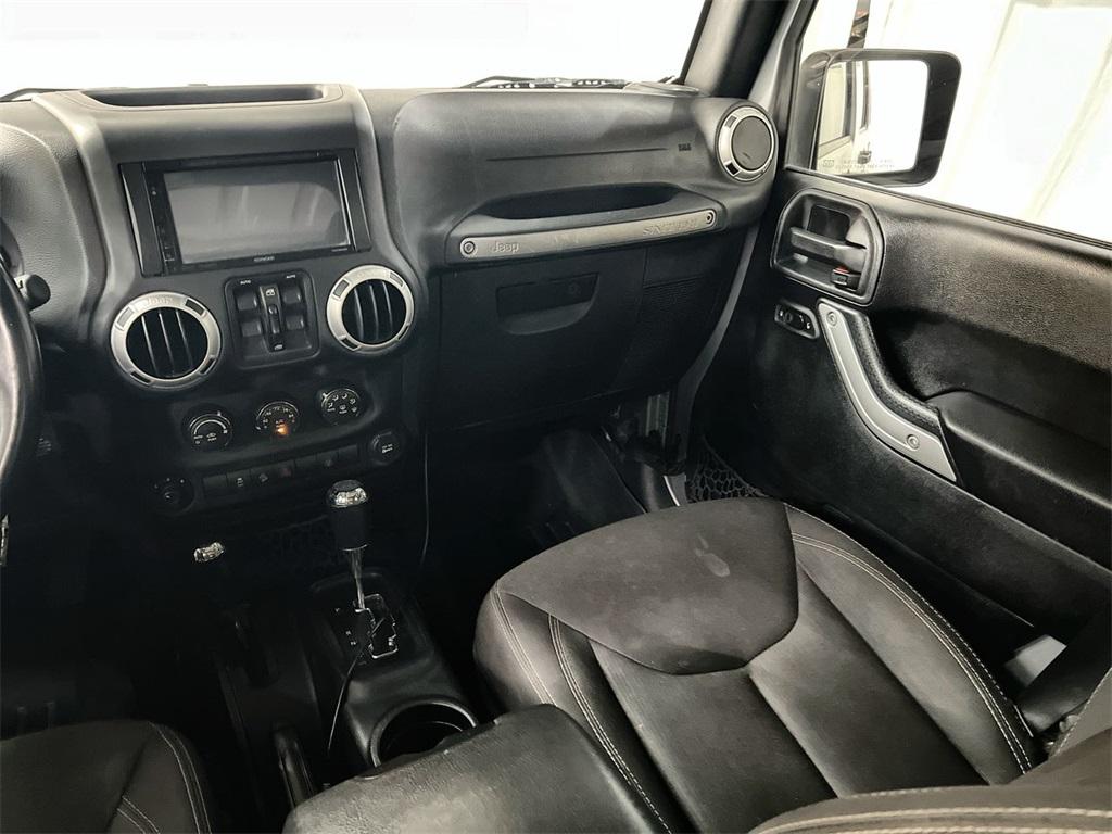 Used 2015 Jeep Wrangler Unlimited Sahara for sale $34,937 at Gravity Autos Marietta in Marietta GA 30060 30