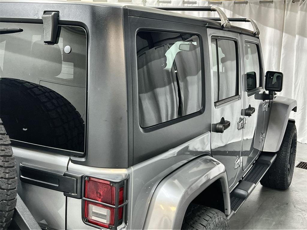 Used 2015 Jeep Wrangler Unlimited Sahara for sale $34,937 at Gravity Autos Marietta in Marietta GA 30060 41